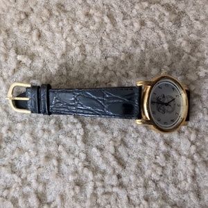 Women Black and gold Teamster watch